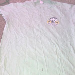 Simply southern blueish greenish t-shirt with one little stain on it